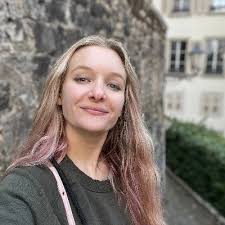 Blonde white woman smiling